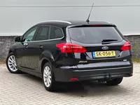 Ford Focus Wagon 1.0 Titanium | PDC | Navigatie | Cruise control | Trekhaak | Foto