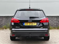 Ford Focus Wagon 1.0 Titanium | PDC | Navigatie | Cruise control | Trekhaak | Foto